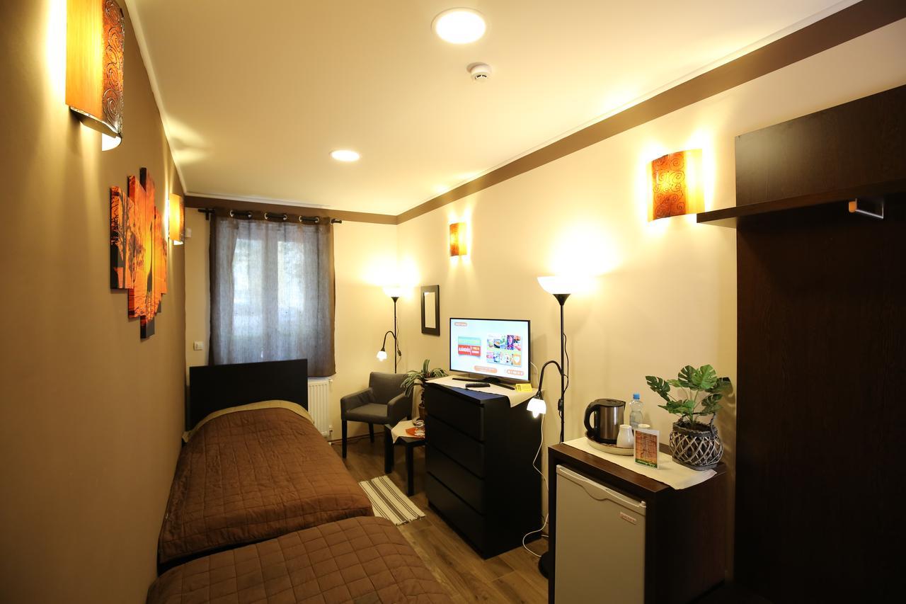 Napraforgo Wellness Haz Es Panzio Bed & Breakfast Pecs Exterior photo